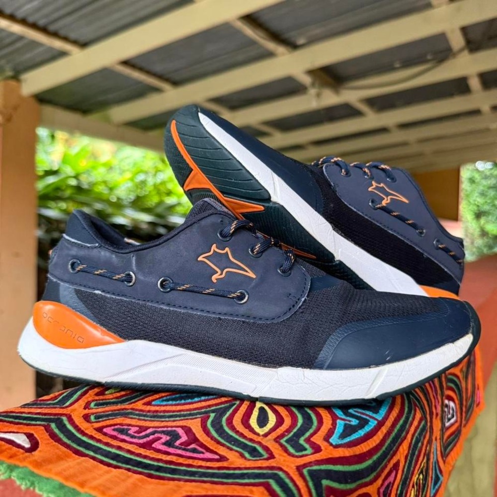Oceania navy orange sneakers in size‎ 7 mens